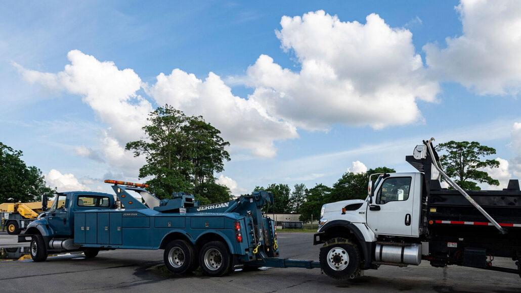 Photo of a truck being towed.